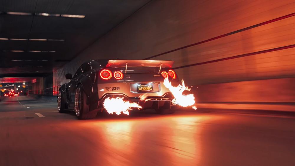 Performance Car Ignites the Night wallpaper