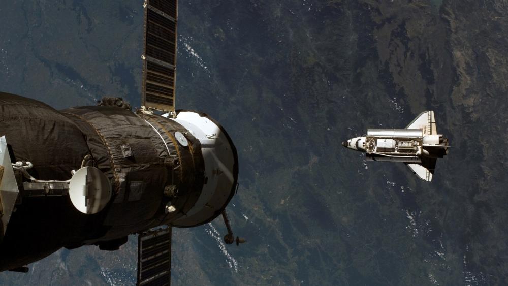 Space Shuttle Approaching Space Station wallpaper