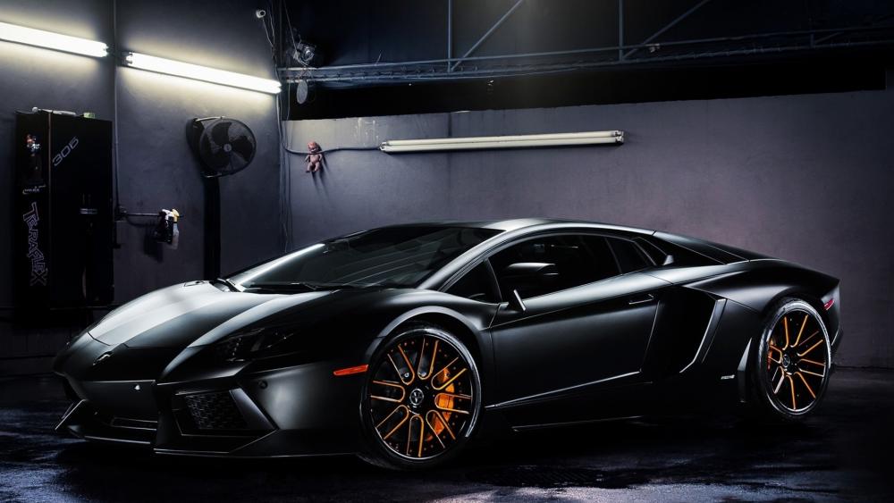 Sleek Black Lamborghini Aventador wallpaper