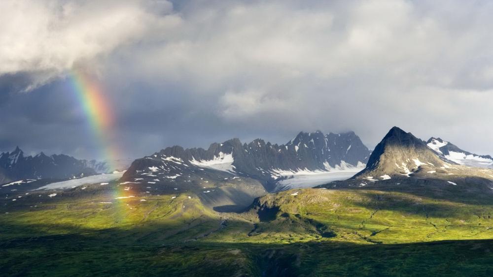 Rainbow Over Majestic Peaks wallpaper