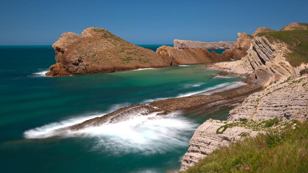 Rocky Serenity by the Sea wallpaper