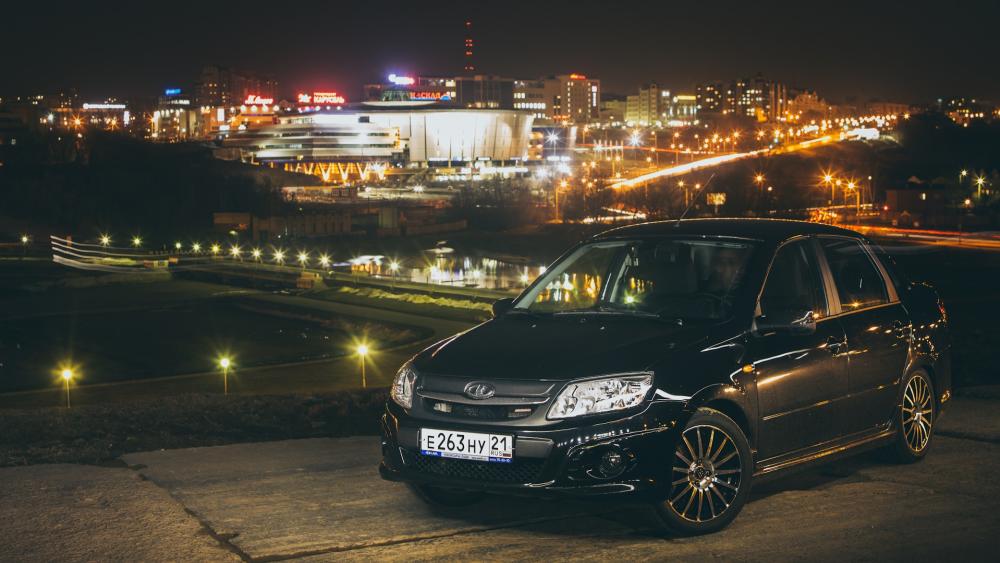 Lada Granta in a Night Cityscape wallpaper