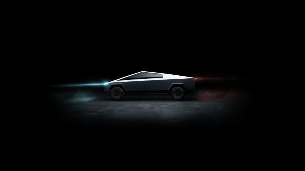 Futuristic Tesla Cybertruck in Darkness wallpaper