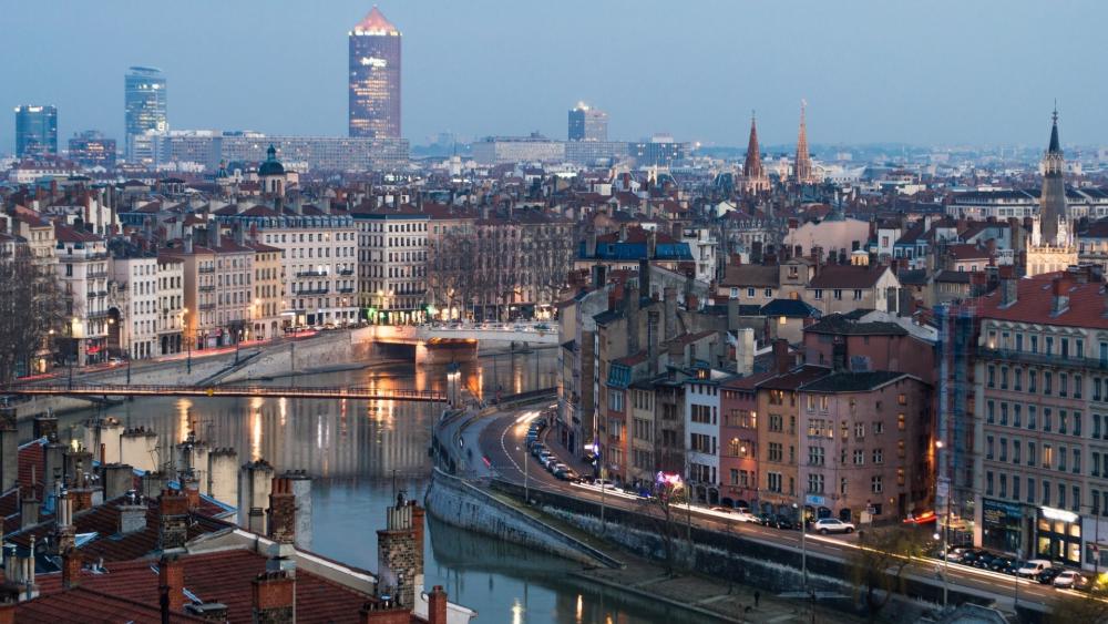 Lyon at Dusk Tranquil River Cityscape wallpaper