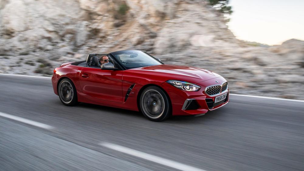 BMW Convertible in Motion: Stunning 4K Vista wallpaper