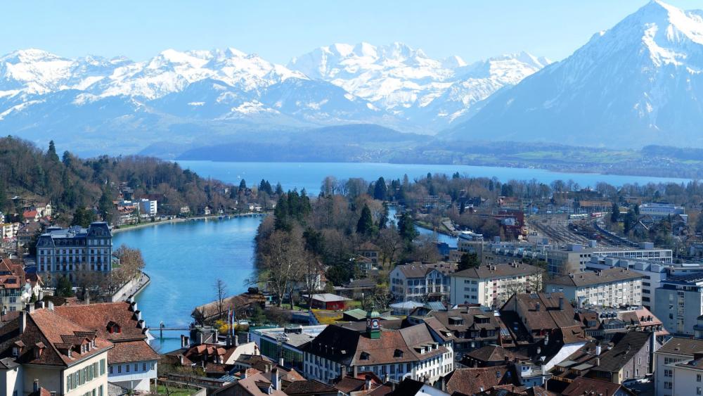 Thun and Thunersee with Majestic Alpine Backdrop wallpaper