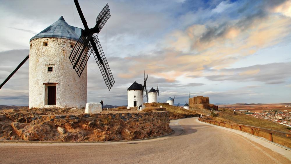 Windmills of Consuegra Against a Sunset Sky wallpaper