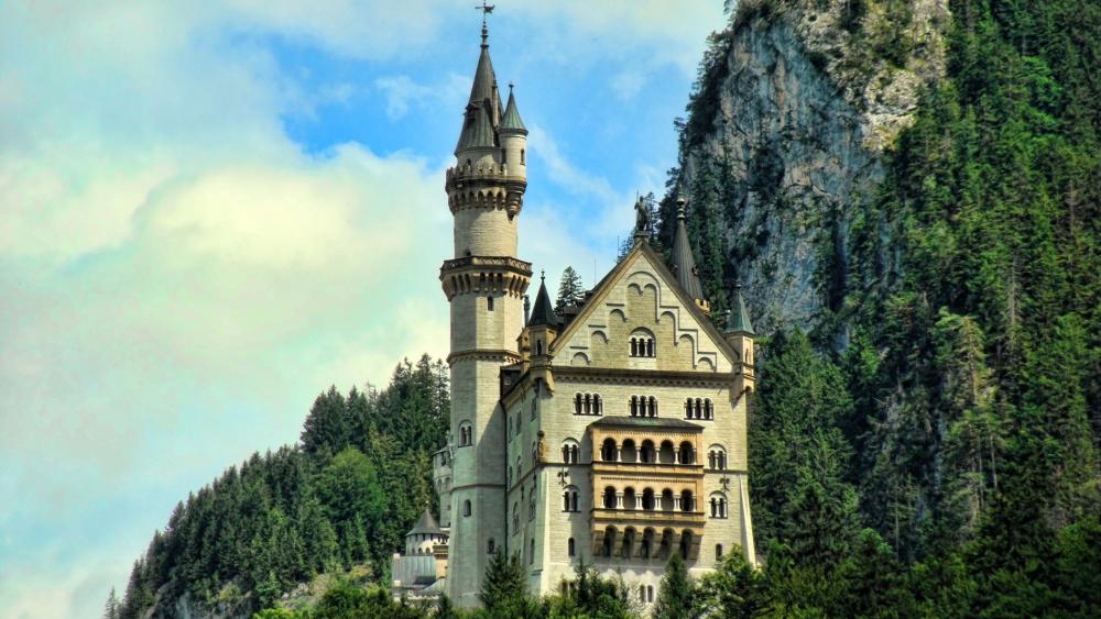 Neuschwanstein Castle Amidst Bavaria’s Lush Landscape wallpaper