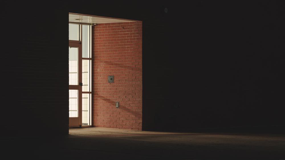 Quiet Urban Corner Doorway at Night wallpaper