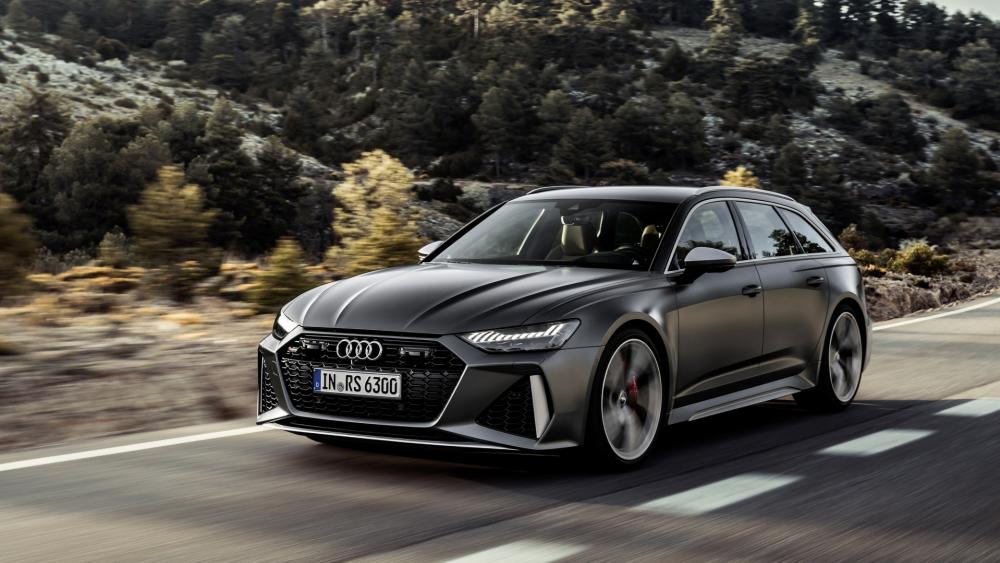 Audi RS6 Speeding Through Nature's Beauty wallpaper