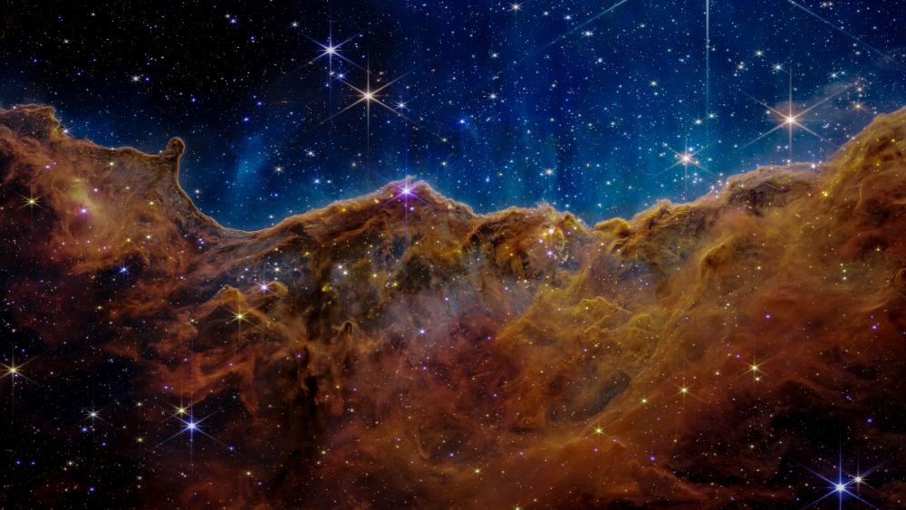 Cosmic Marvels Embraced by the Universe's Light wallpaper