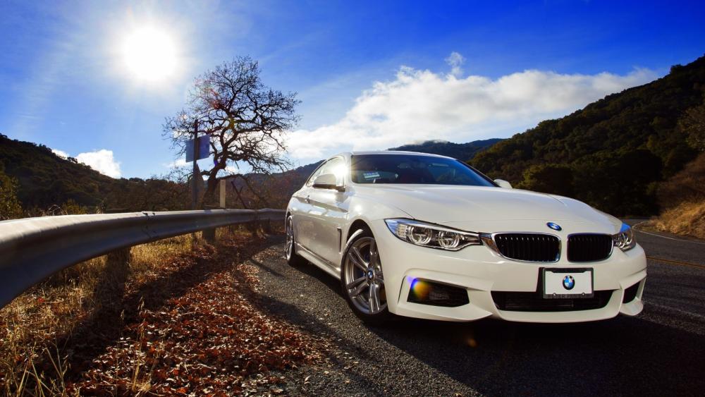 Sleek White BMW on Scenic Drive wallpaper