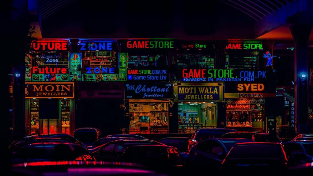 Neon Game Store at Night Cityscape wallpaper