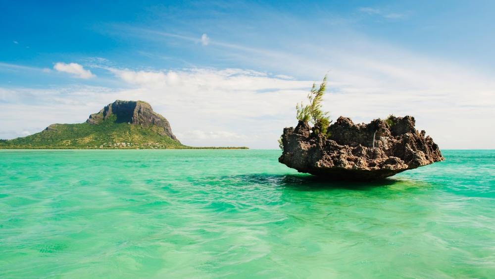 Mauritian Islet Surrounded by Crystal Waters wallpaper