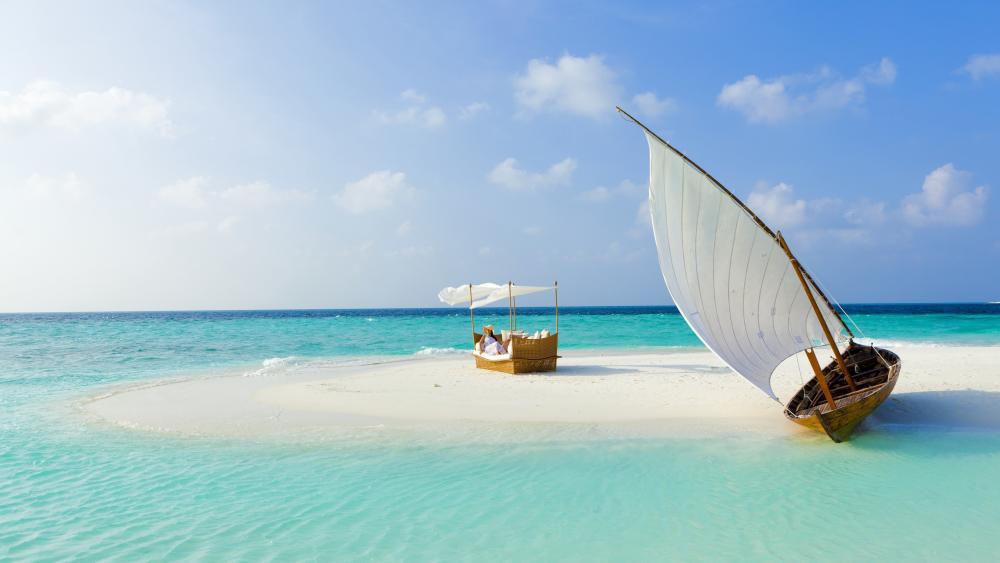 Sailboat Serenity on a Tranquil Islet wallpaper