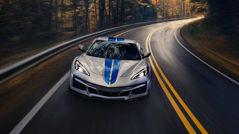 Chevrolet Corvette E-Ray Speeding on Scenic Road wallpaper