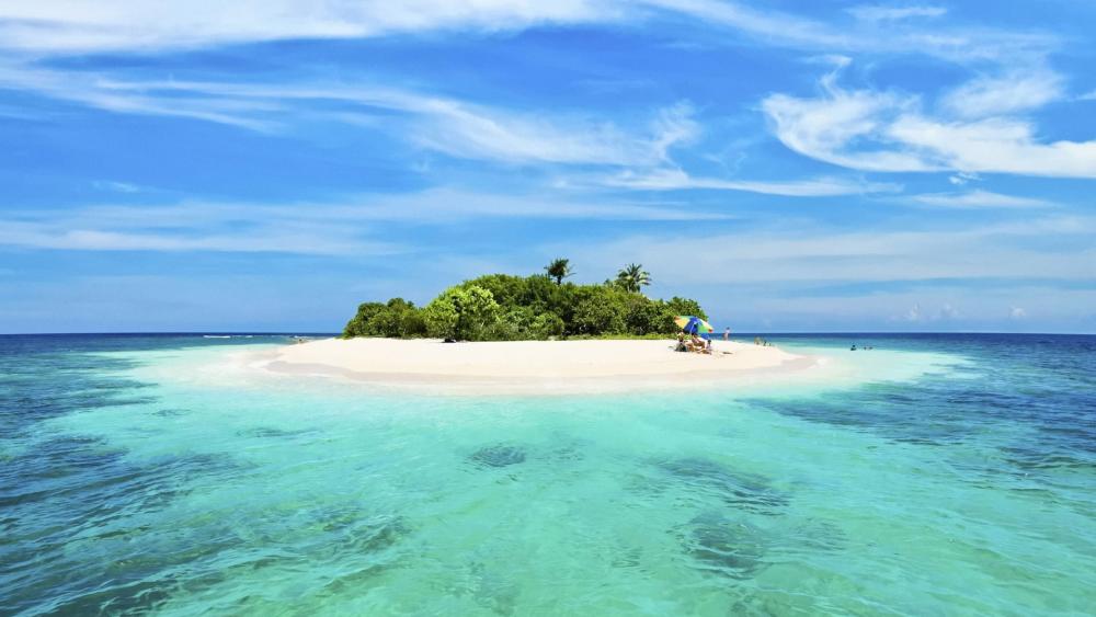 Tranquil Islet Oasis in the Caribbean wallpaper