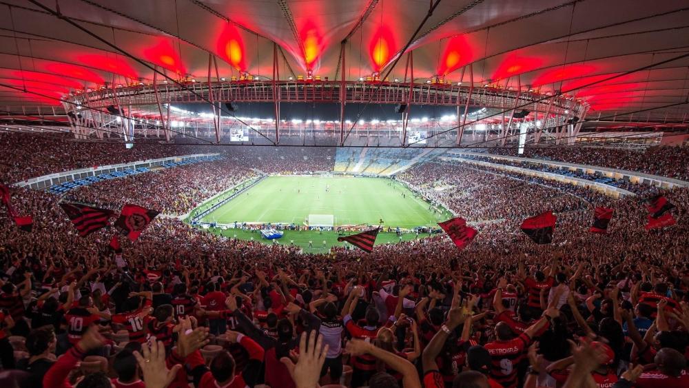 Soccer Stadium Alive with Fans' Energy and Passion wallpaper