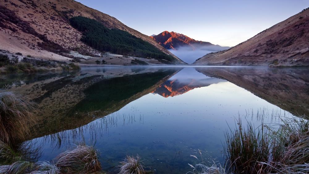 Tranquil Reflections at Lake Kirkpatrick, New Zealand wallpaper