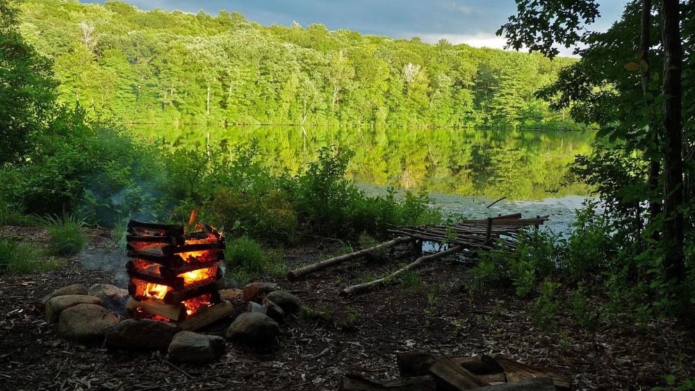 Campfire Serenity by the Lakeside wallpaper