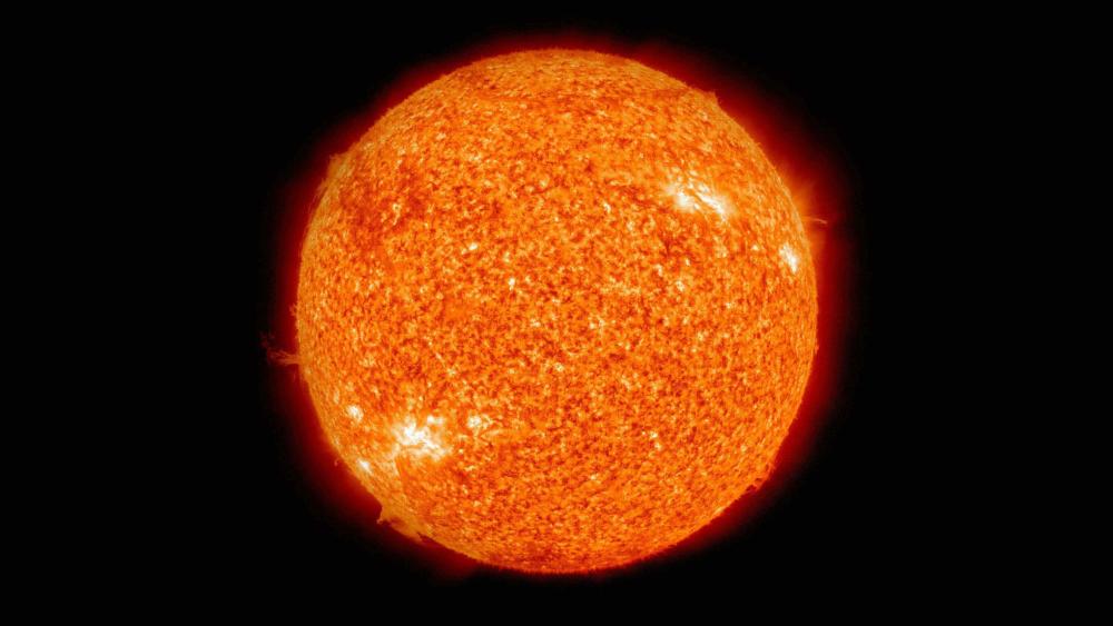 Radiant Explosion of Solar Energy in Space wallpaper