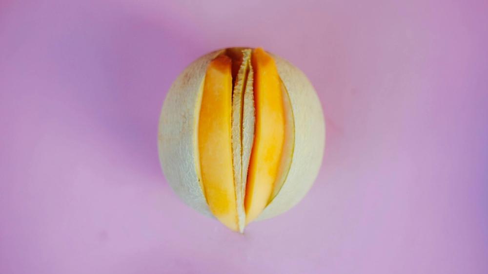 Melon Medley: A Playful Perspective on Fruit Art wallpaper