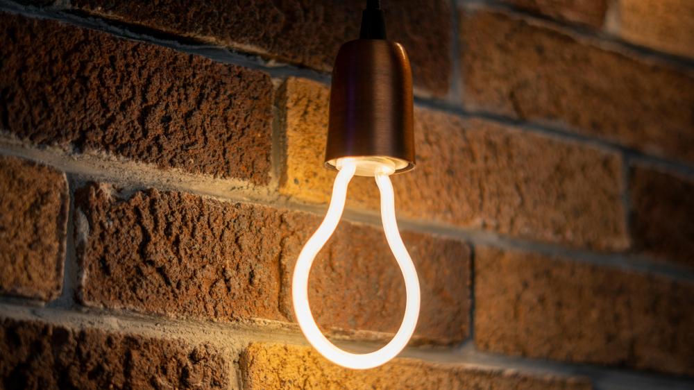 LED Elegance Against Brick Wall wallpaper