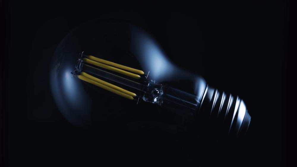 Incandescent Glow Against Darkness wallpaper
