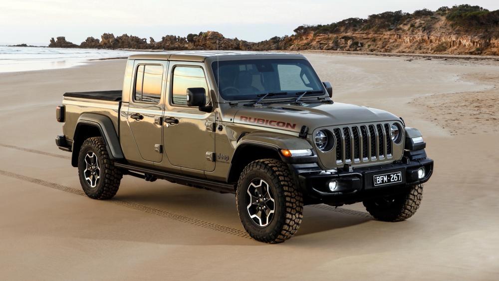 Jeep Gladiator Pickup on Sandy Beach wallpaper