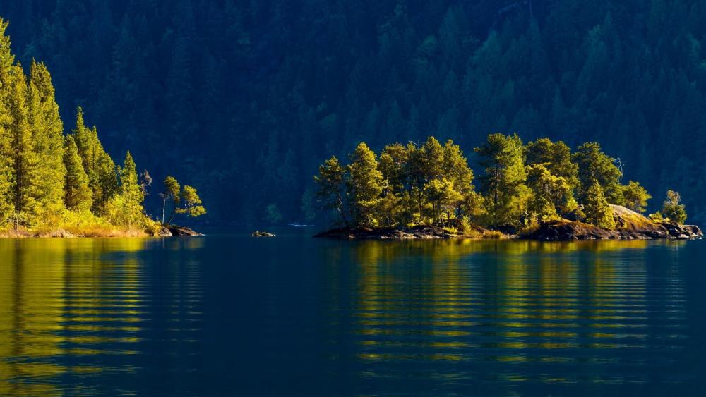 Tranquil Island Amidst Mountain Lake Serenity wallpaper