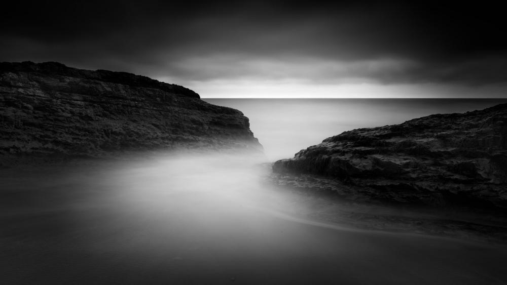 Misty Coastline Serenity in Monochrome wallpaper