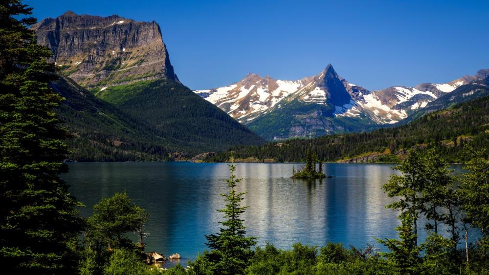 Saint Mary Lake's Majestic Mountain Reflections in Glacier National Park wallpaper