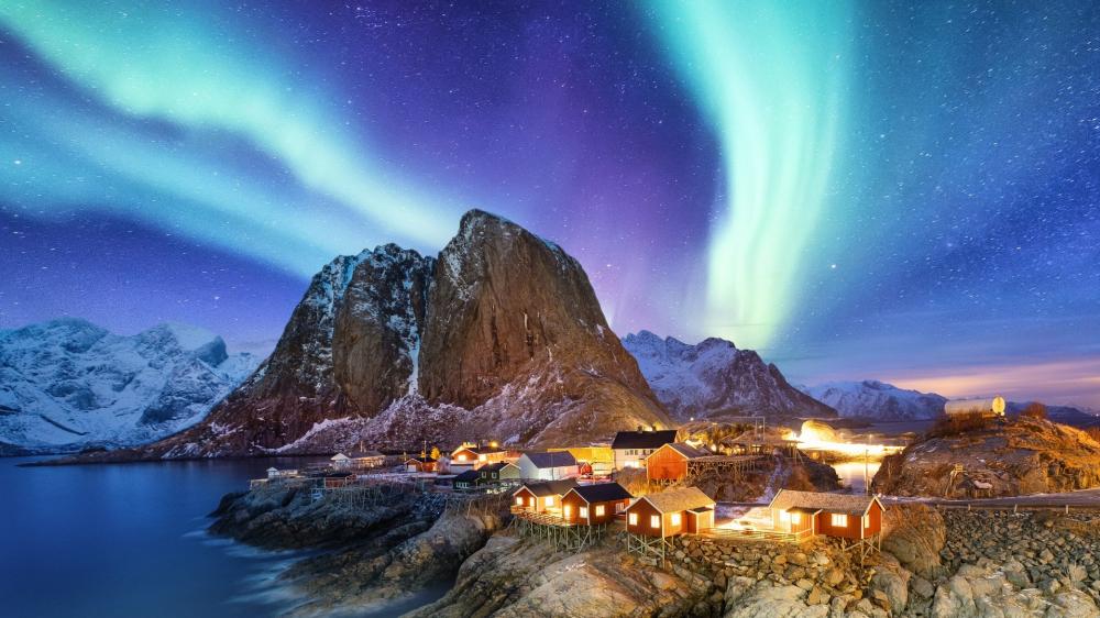 Aurora Over Hamnoy's Majestic Landscape in Lofoten wallpaper