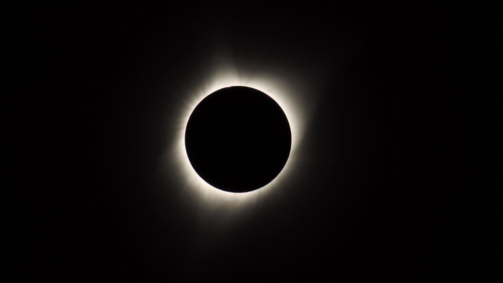 Ethereal Eclipse: Celestial Dance in Darkness wallpaper
