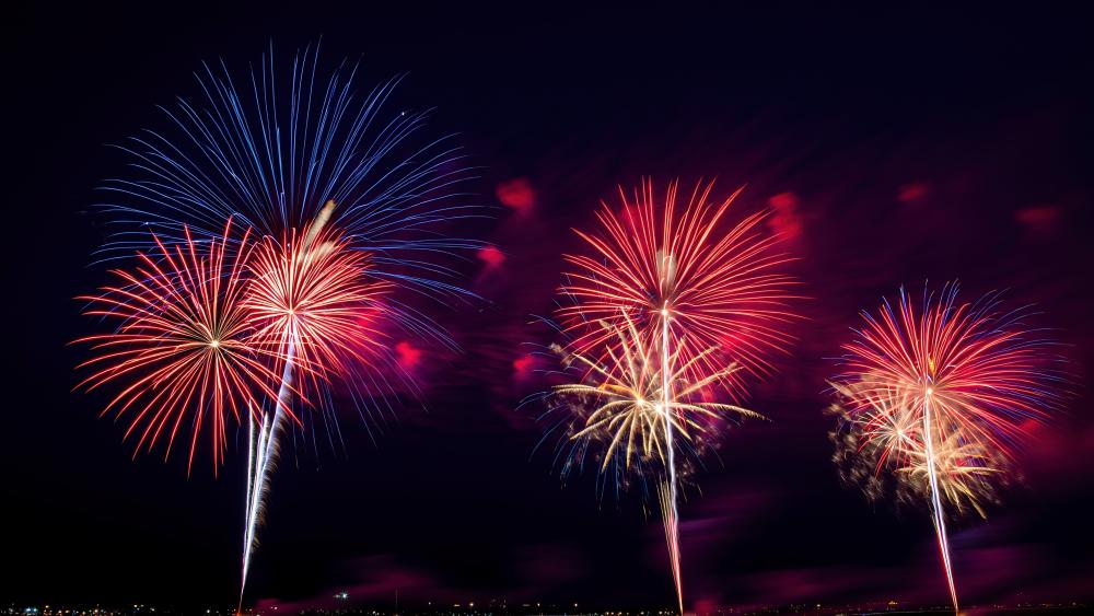 Fireworks Symphony in Vibrant Skies 5K wallpaper