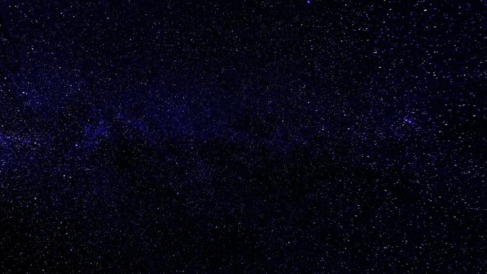 Endless Night Sky Filled with Distant Stars wallpaper