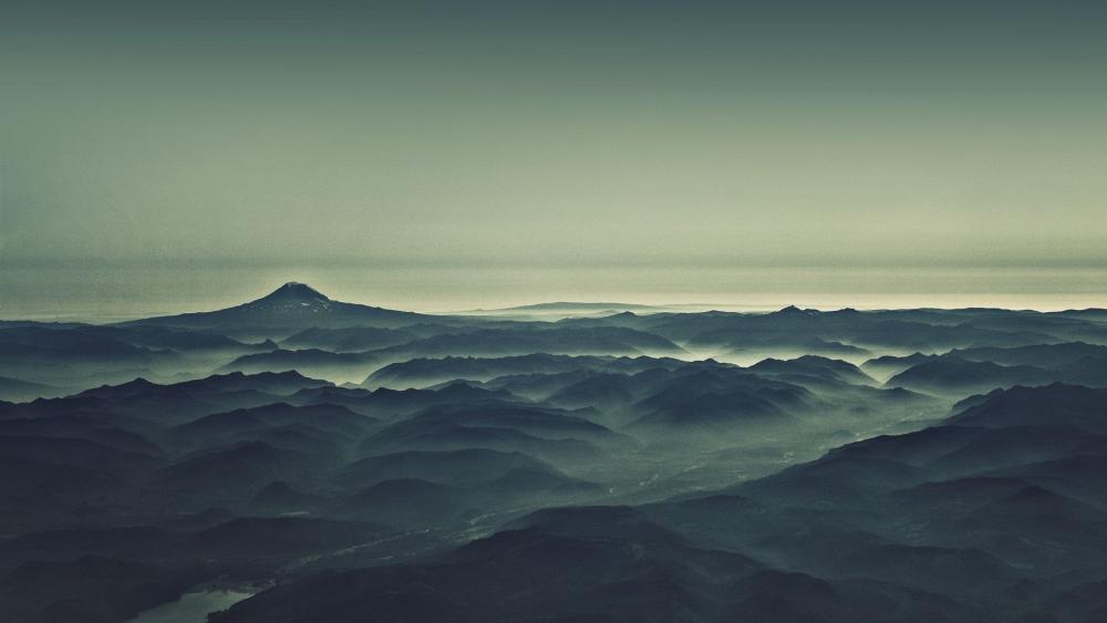 Misty Mountain Range at Dawn wallpaper