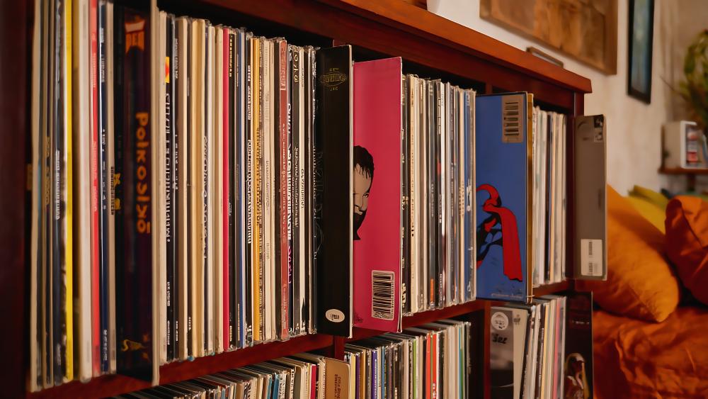 Vinyl Reverie Retro Record Shelf Displayed in 5K Glory wallpaper