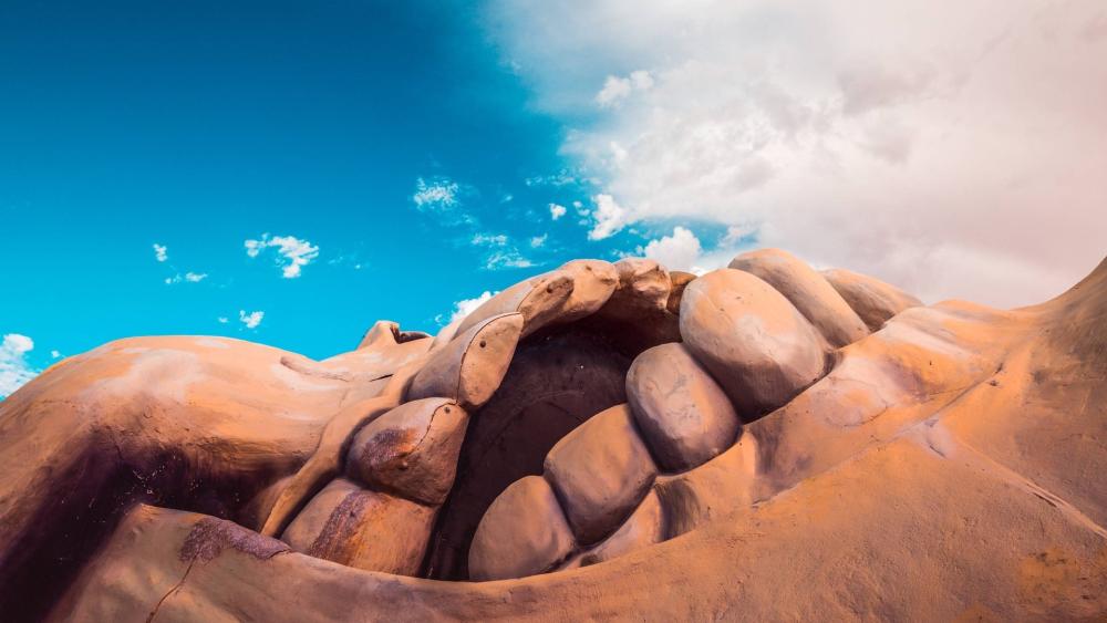 Rocky Giant's Mouth in the Sky wallpaper
