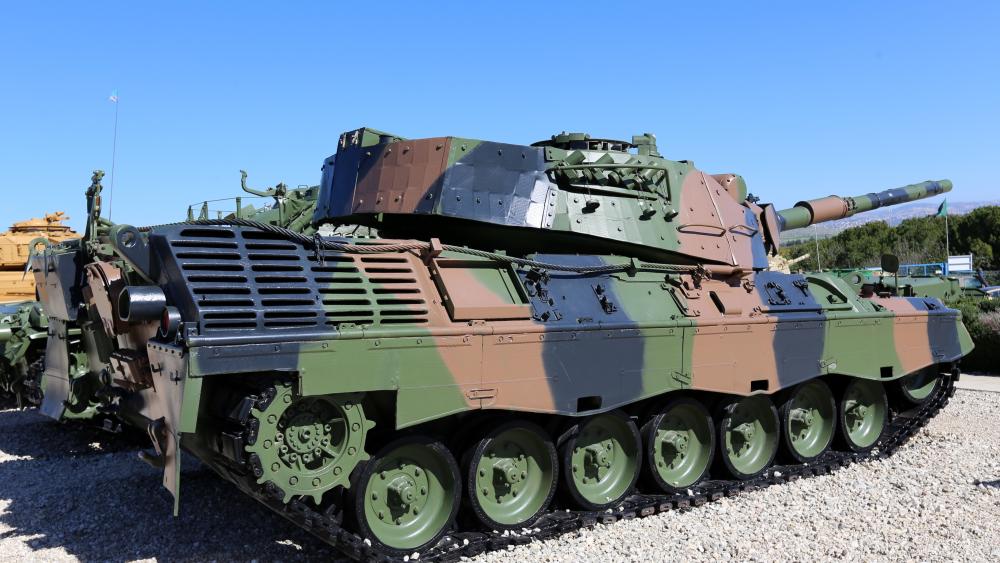 Tank in Camouflage with Military Precision wallpaper