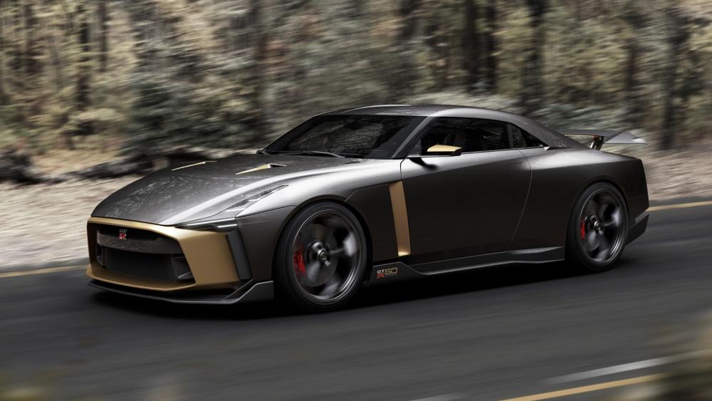 Nissan GT-R50 Speeding through a Forest Road wallpaper