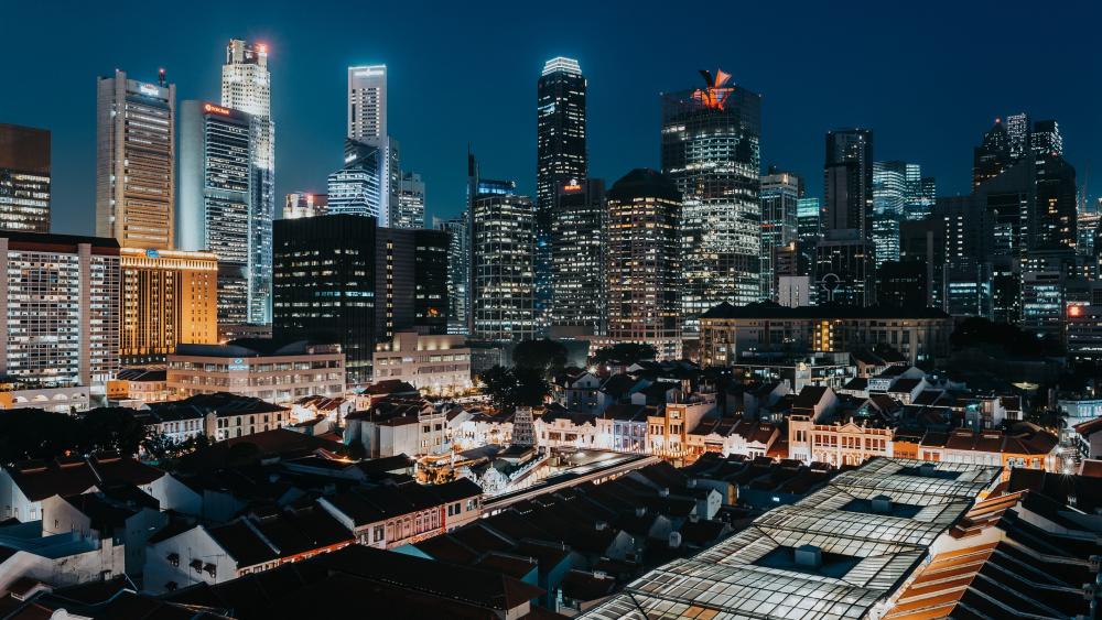 Skyscrapers Illuminated in Nighttime Splendor wallpaper
