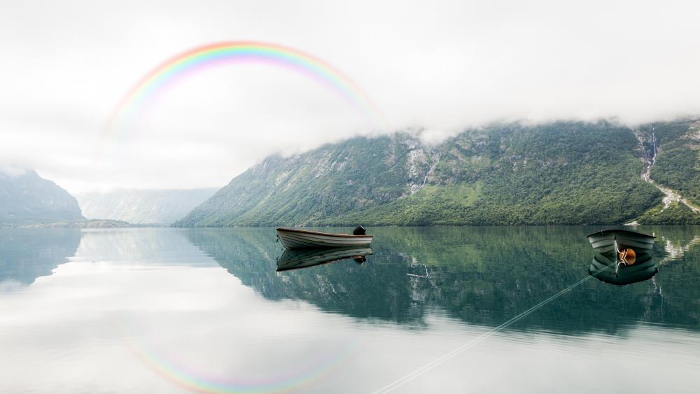 Boat at lake and a rainbow cross over mountains heart wallpaper