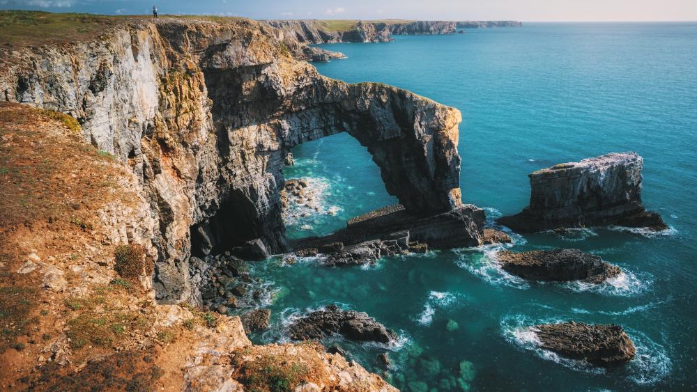 Majestic Coastal Arch of Pembrokeshire wallpaper