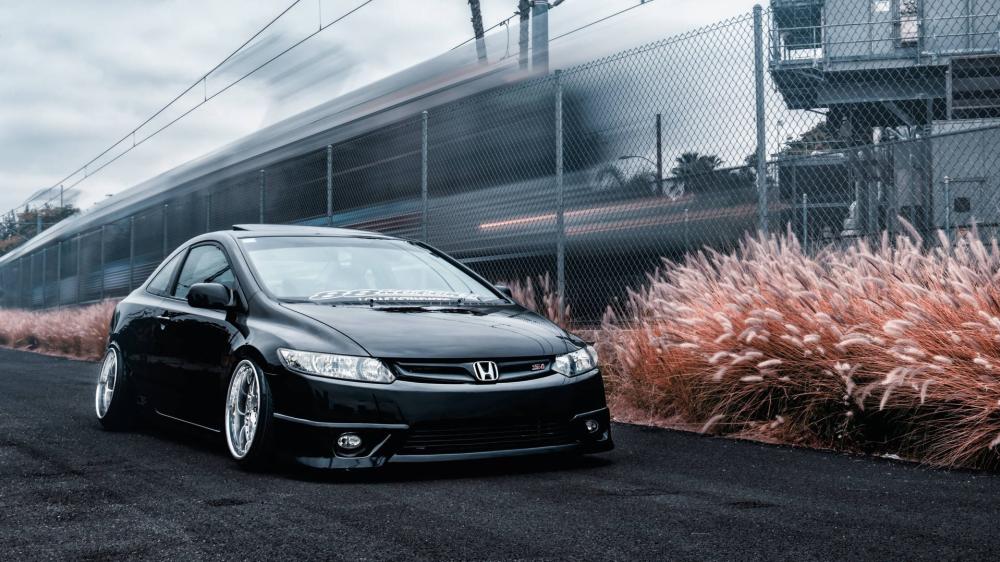 JDM Elegance Honda Civic Against Urban Backdrop wallpaper