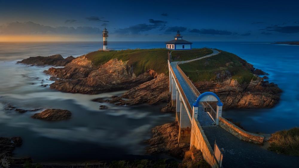 Illa Pancha Lighthouse at Twilight in Spain wallpaper