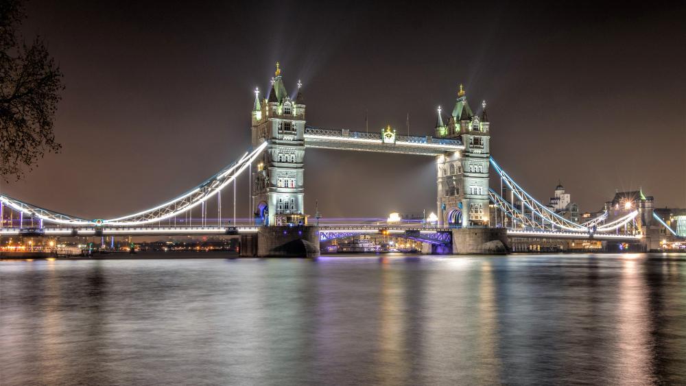 Tower Bridge Shining over the Thames at Night wallpaper