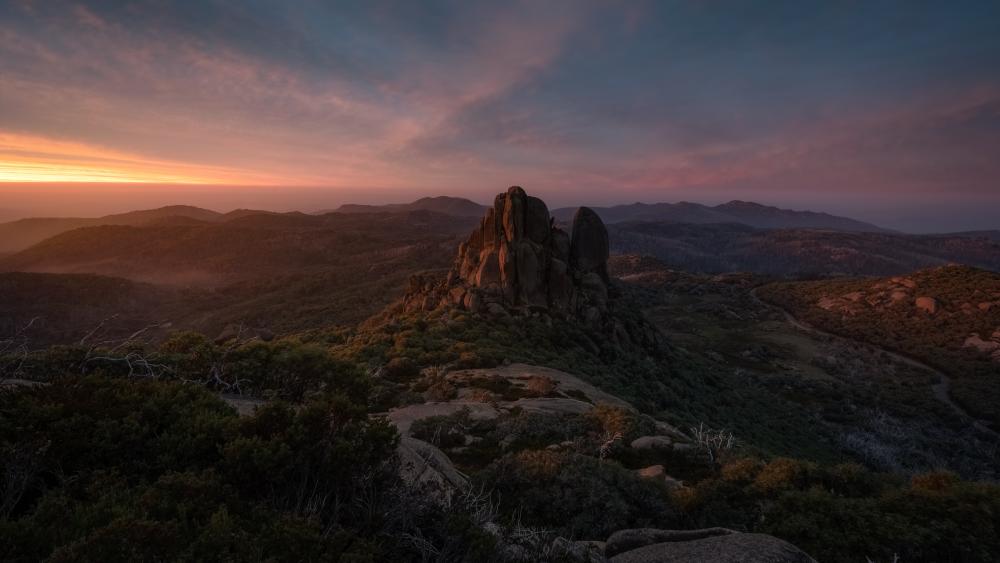 Majestic Sunset over Rocky Outcrop in 8K wallpaper