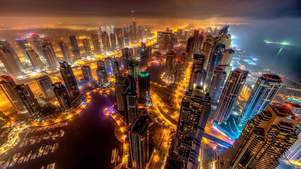Dubai Marina Illuminated: A Nighttime Aerial Spectacle wallpaper