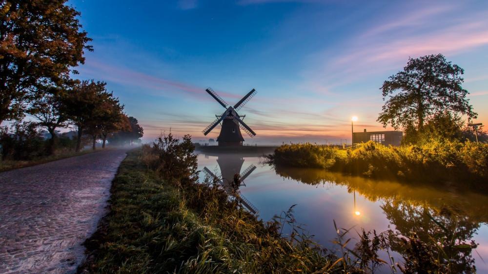 Morning Tranquility by the Mill in Foggy Netherlands wallpaper